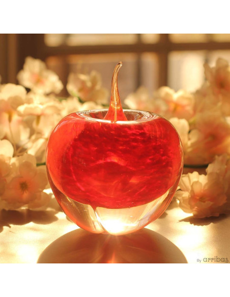 Red apple in glass